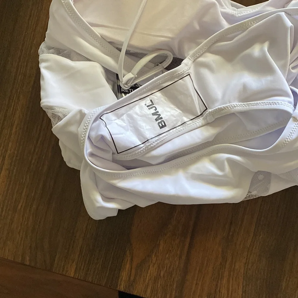 This is ladies swimming suit with pads‎ in the bust area .This suit is new .